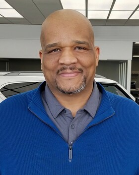 Staff member Carvol Coleman from ID_051328ae1780