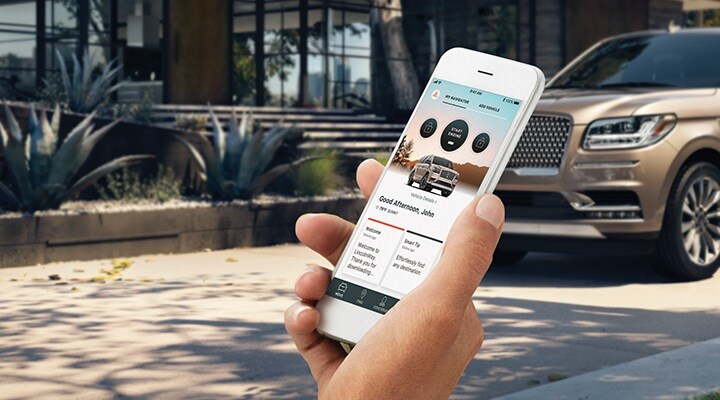  Person holding phone with Lincoln Way App open from State Motors Lincoln.jpg