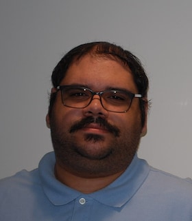 Staff member Tavis Feliciano from c76ddc8d8561