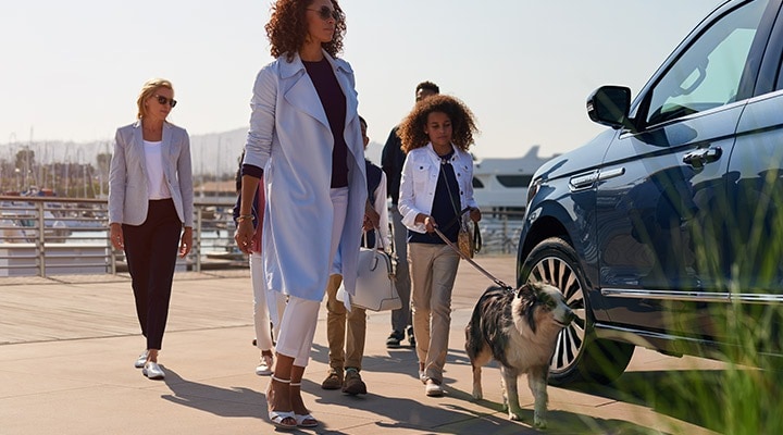  Family walking dog to their vehicle from State Motors Lincoln.jpg