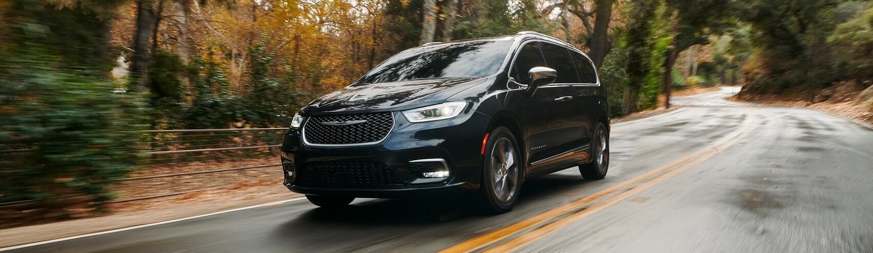 Certified Pre-Owned Chrysler Dealer Plainville MA Chrysler minivan driving thoruhg mountain road