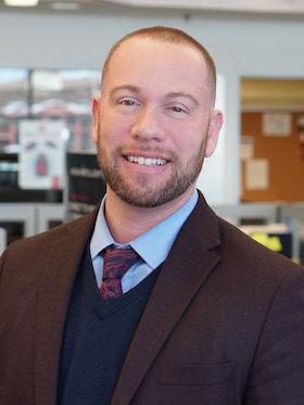 Staff member Michael Romanvo from ID_2057e922c7c0
