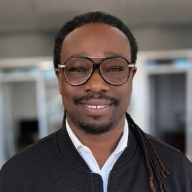 Staff member Wilnick Tunis from ID_53ee6ff990ef