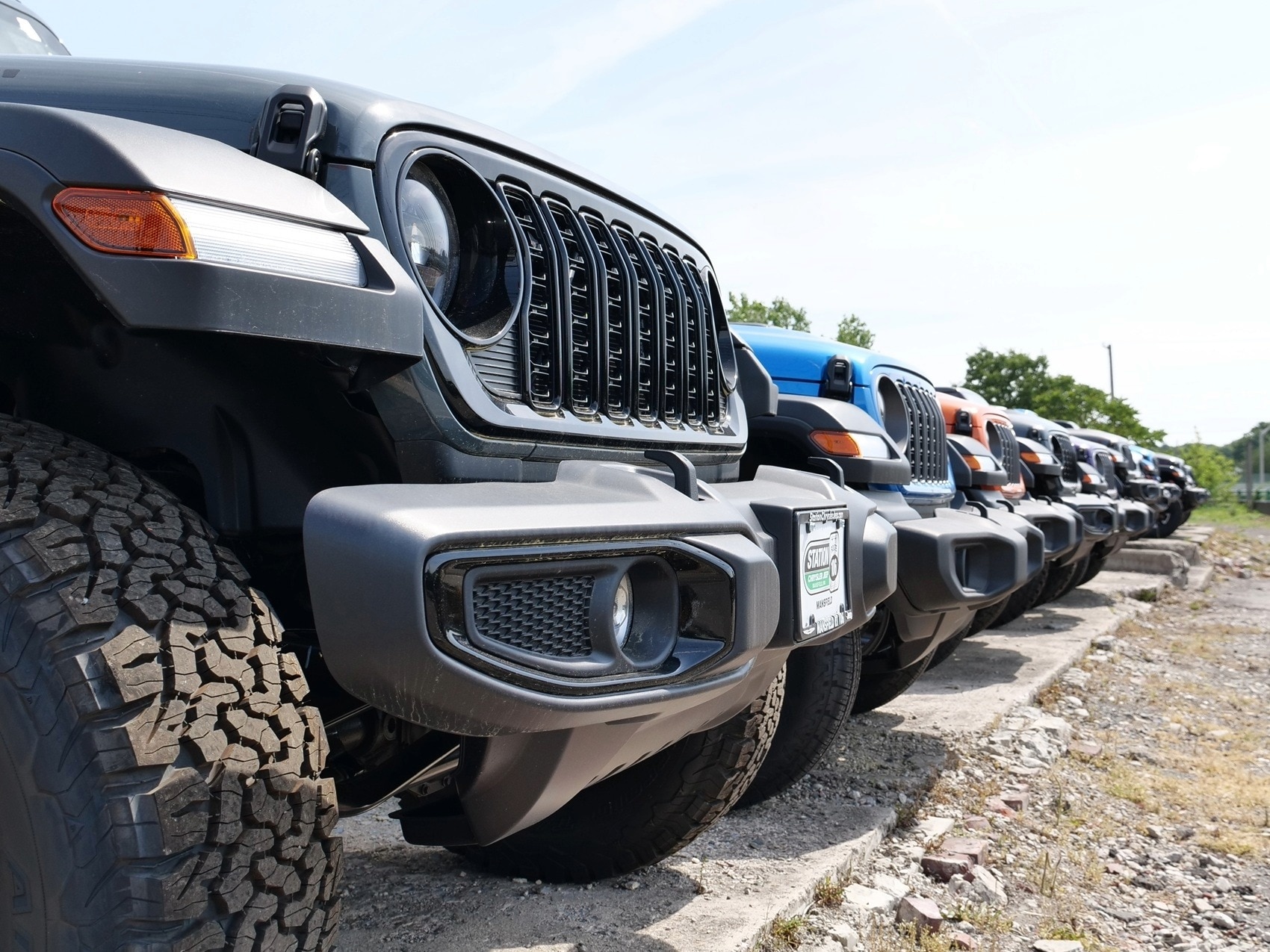 Vehicles lined up at dealership