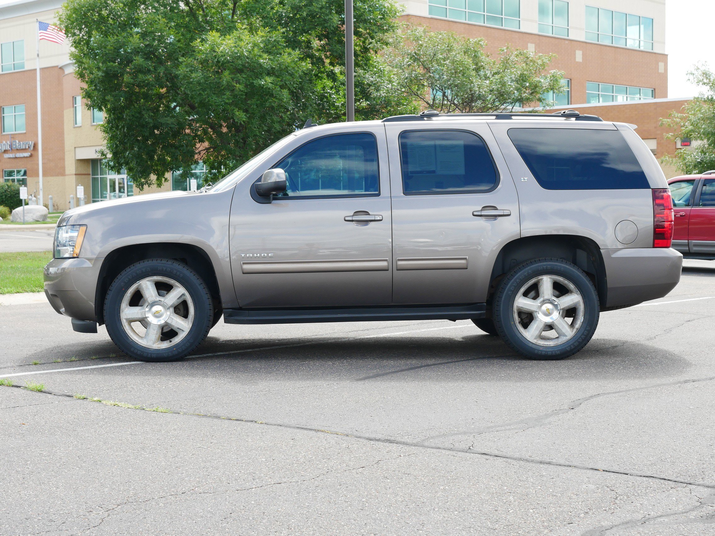 Used 2011 Chevrolet Tahoe LT with VIN 1GNSKBE07BR395193 for sale in Waite Park, Minnesota