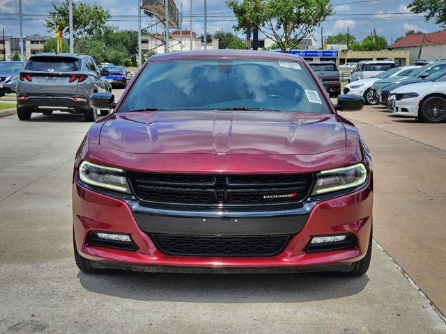 Used 2018 Dodge Charger SXT with VIN 2C3CDXHGXJH174140 for sale in Houston, TX