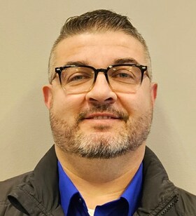 Staff member Andrew Miller from ID_232768addae9