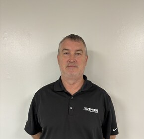 Staff member Tom Brown from ID_7282d4