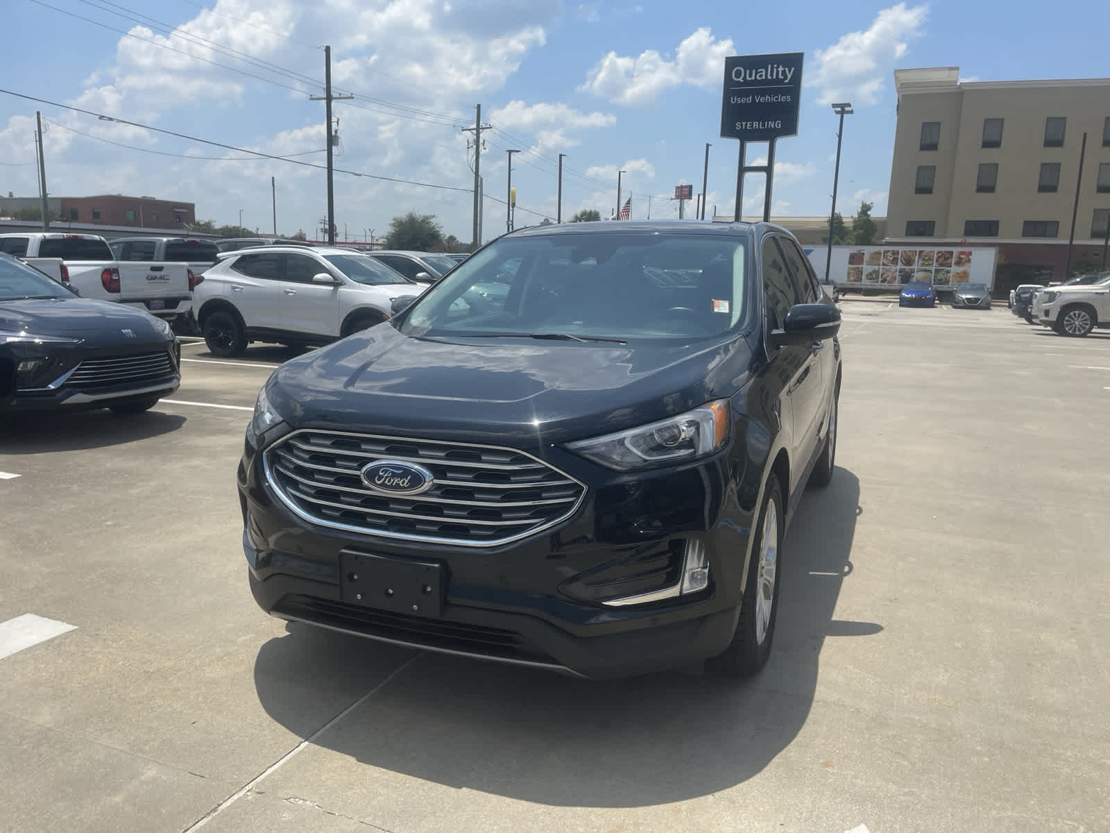 Used 2021 Ford Edge Titanium with VIN 2FMPK4K95MBA14276 for sale in Jennings, LA