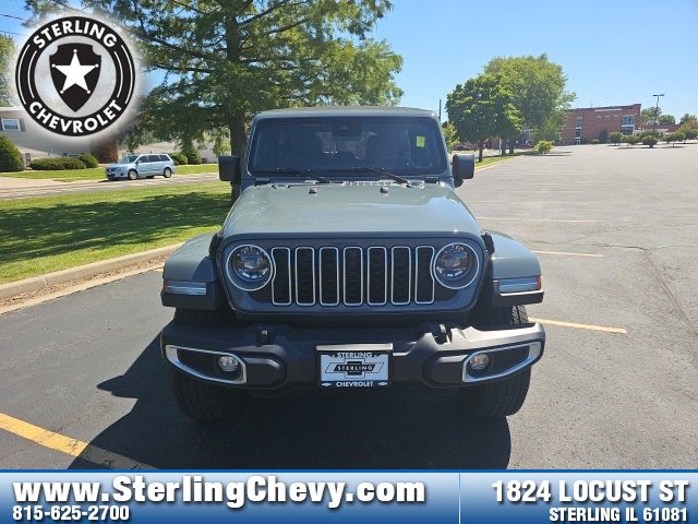 Used 2024 Jeep Wrangler 4-Door Sahara with VIN 1C4PJXEG7RW267639 for sale in Sterling, IL