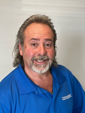 Staff member Ron Bennett from a03780cbadef
