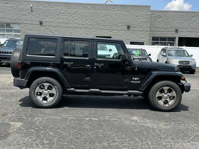 Used 2017 Jeep Wrangler Unlimited Sahara with VIN 1C4BJWEG8HL581157 for sale in Sterling Heights, MI