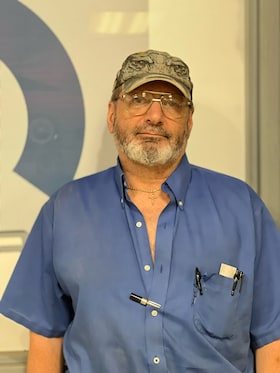 Staff member Joe McQueen from 708442c5a210
