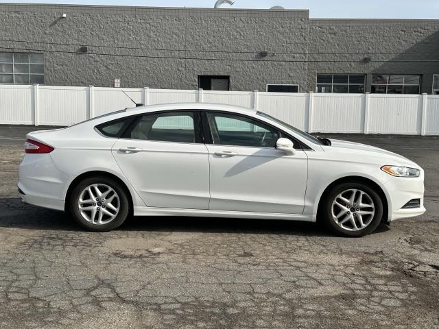 Used 2014 Ford Fusion SE with VIN 3FA6P0H79ER335813 for sale in Sterling Heights, MI
