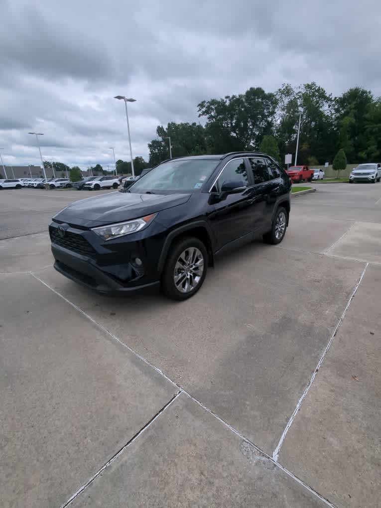 Used 2021 Toyota RAV4 XLE Premium with VIN 2T3C1RFV0MW181104 for sale in Lafayette, LA