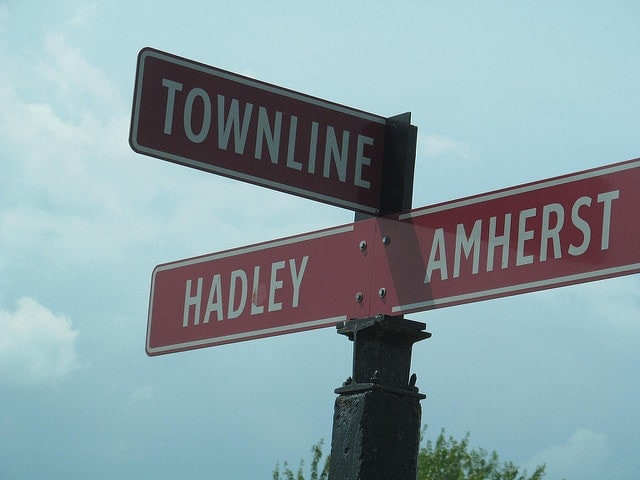 sign marking the city line between Amherst and Hadley, MA