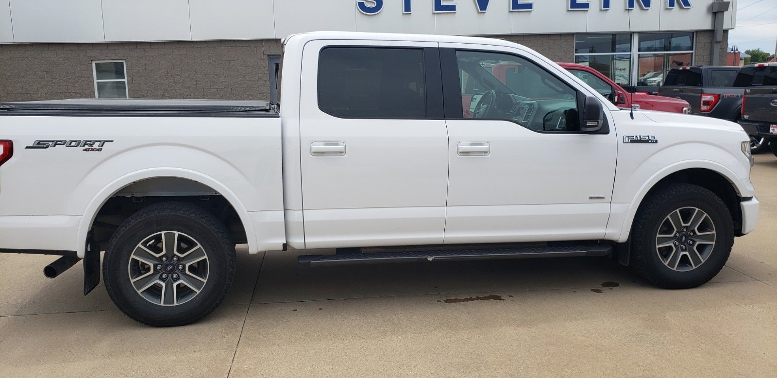 Used 2015 Ford F-150 XLT with VIN 1FTEW1EP9FKF22980 for sale in Grinnell, IA