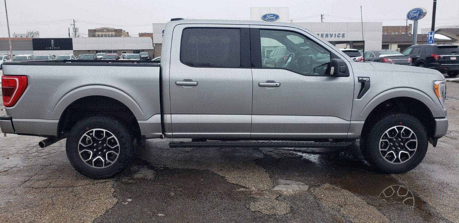 Used 2022 Ford F-150 XLT with VIN 1FTFW1E88NKE96559 for sale in Grinnell, IA