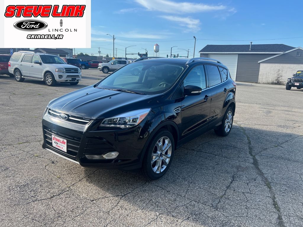 Used 2014 Ford Escape Titanium with VIN 1FMCU9J95EUB01002 for sale in Grinnell, IA