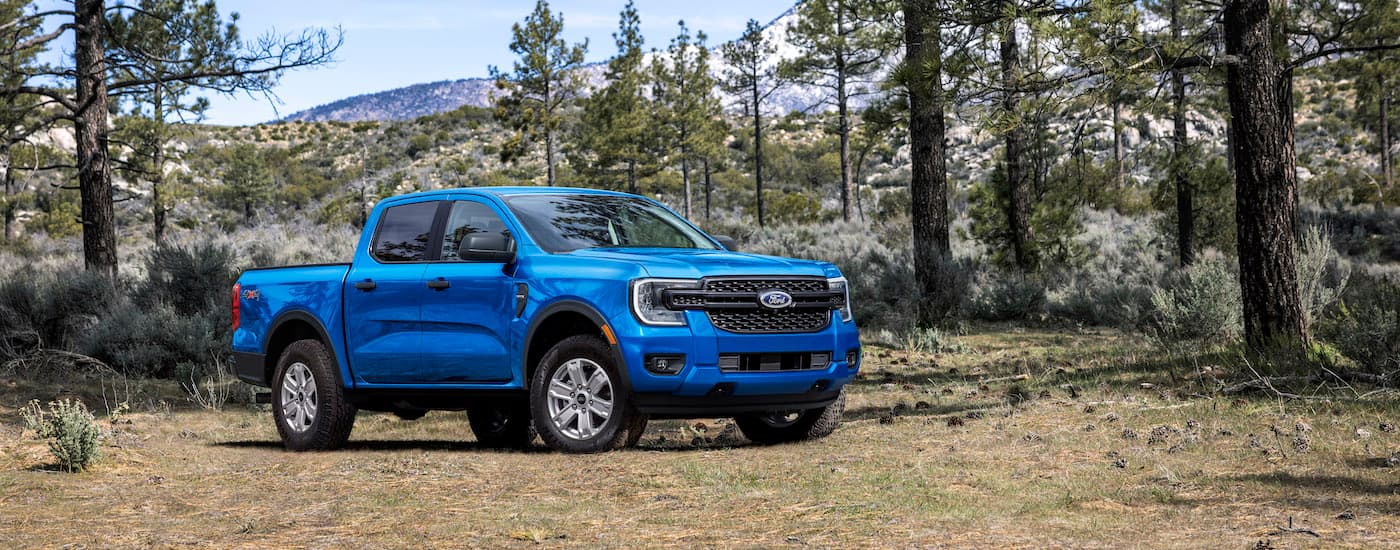 A blue 2024 Ford Ranger XL STX is shown from the front at an angle.