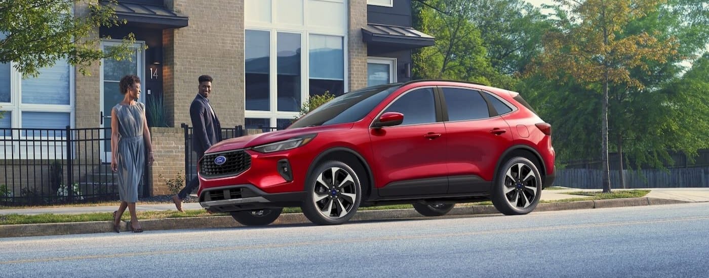 A red 2025 Ford Escape is shown parked after visiting a Ford dealer near Martin.