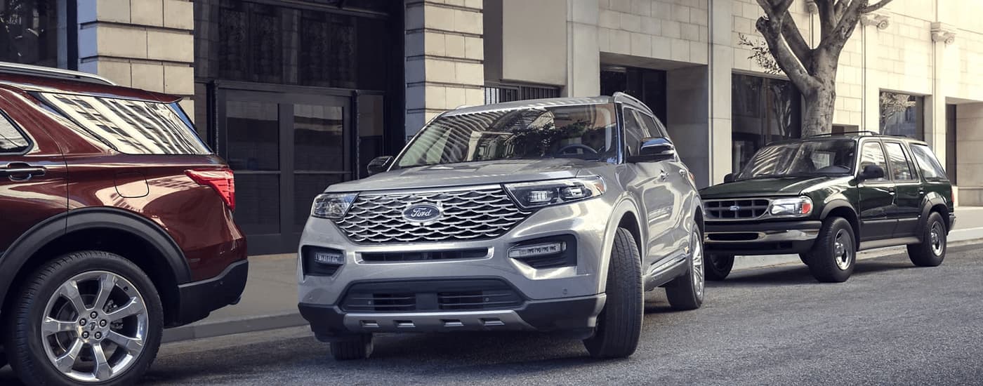A silver 2023 Ford Explorer for sale is shown from the front at an angle.