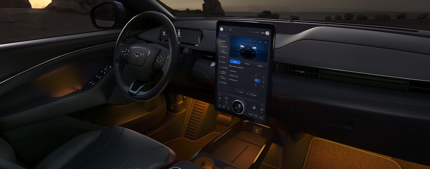 Orange ambient lighting inside the cabin of a 2024 Ford Mustang Mach-E for sale near Jackson.