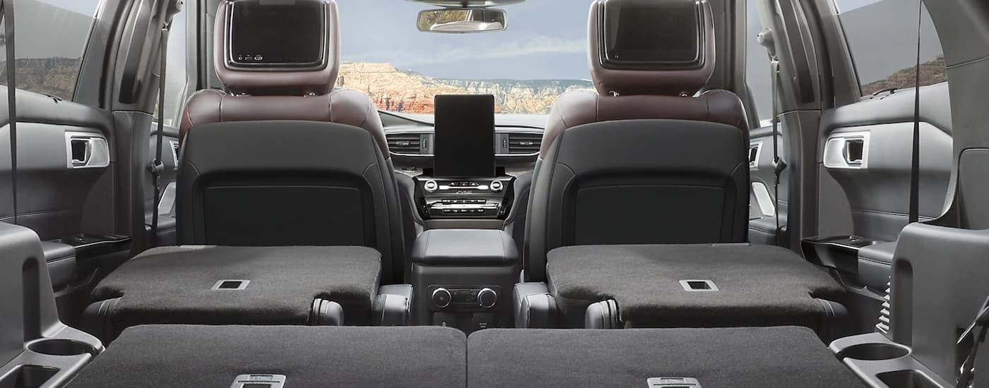 Rear folded seats in a 2023 Ford Explorer at a used Ford dealer near McKenzie.