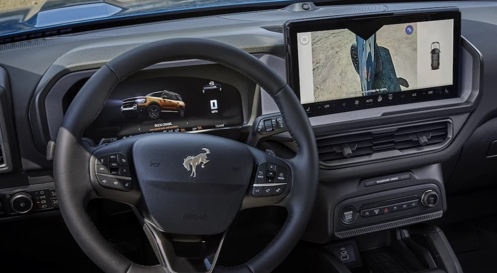 The black dash is shown in a 2025 Ford Bronco Sport.