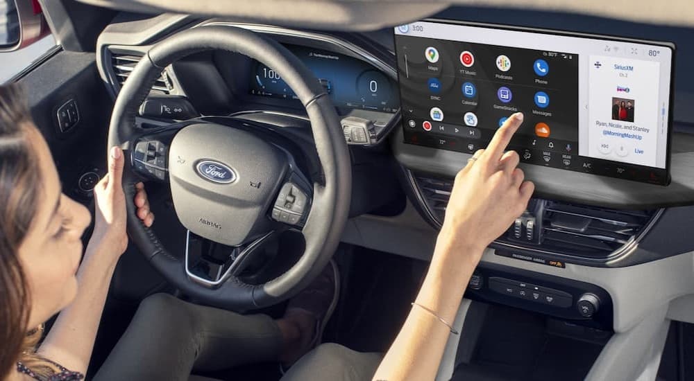 The gray interior and dash is shown in a 2024 Ford Escape for sale.