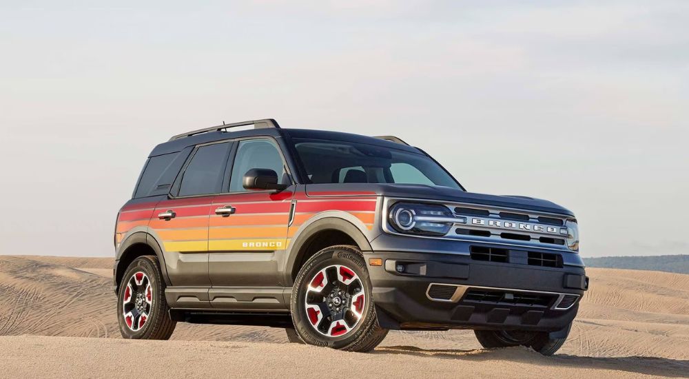 A multi-colored 2024 Ford Bronco Sport Free Wheeling is shown off-road.