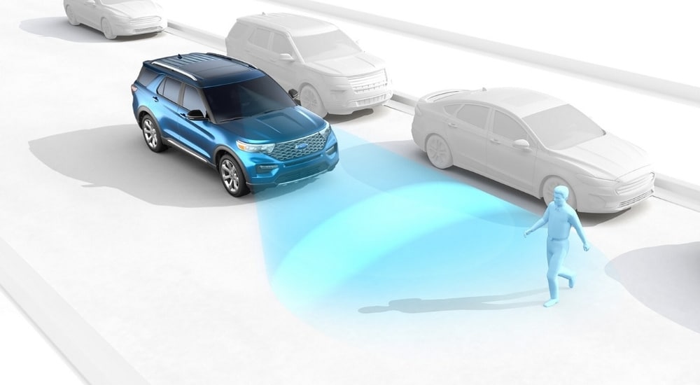 Simulated image of the PreCollision Assist feature utilized by a blue 2025 Ford Explorer.