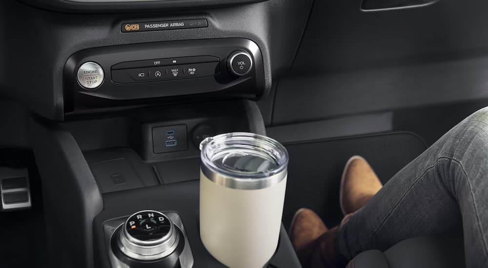 A close up of the center console in a 2024 Ford Escape for sale at a Ford dealer near McKenzie.