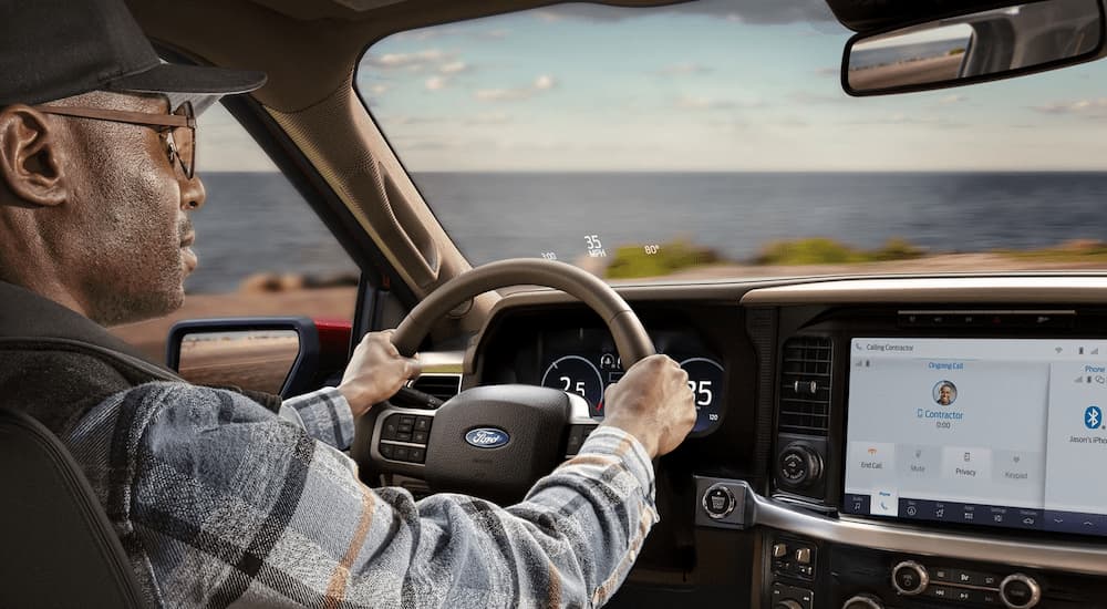 A man is test driving a 2025 Ford F-150 King Ranch for sale near Trenton.