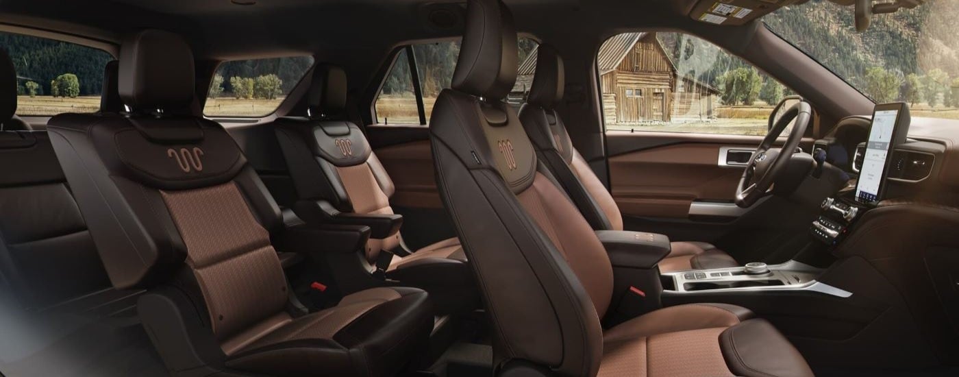 Side view of three rows of seating in a 2021 Ford Explorer King Ranch at a Ford dealer near McKenzie.