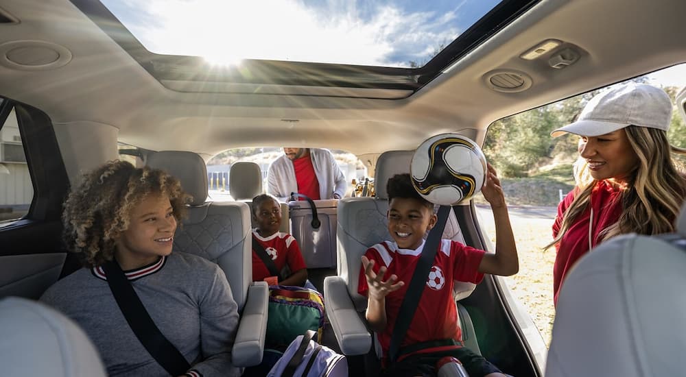 A family going to a soccer game in a 2025 Ford Explorer.