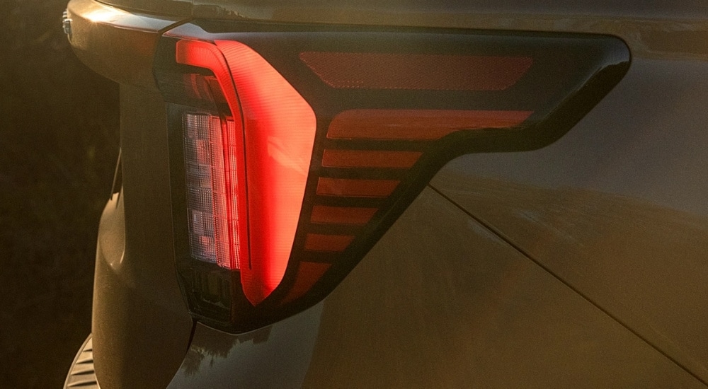 Passenger side taillight on a grey 2025 Ford Explorer.
