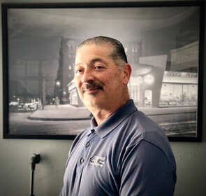 Staff member Juan Gomez from 740a7778f148