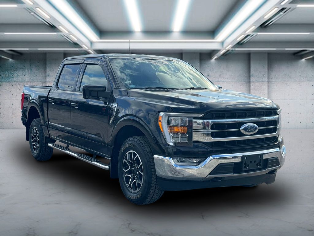 Used 2021 Ford F-150 Lariat with VIN 1FTFW1E84MKD77700 for sale in Patchogue, NY