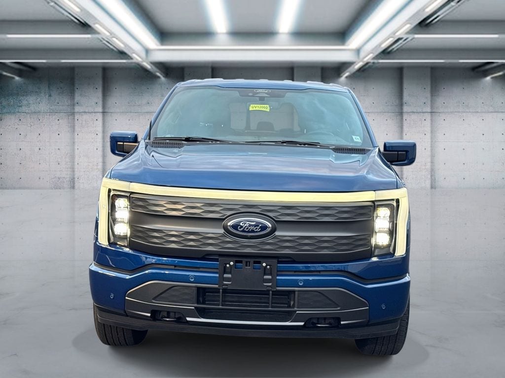 Used 2022 Ford F-150 Lightning Lariat with VIN 1FTVW1EL1NWG15884 for sale in Patchogue, NY