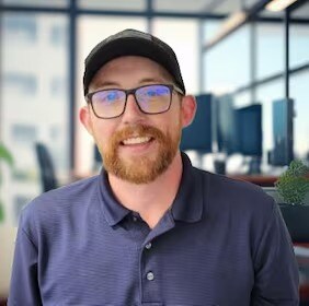 Staff member Tyler Simmons from ID_427558