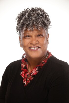 Staff member Valeri Robinson from 2d1b0f9102a3