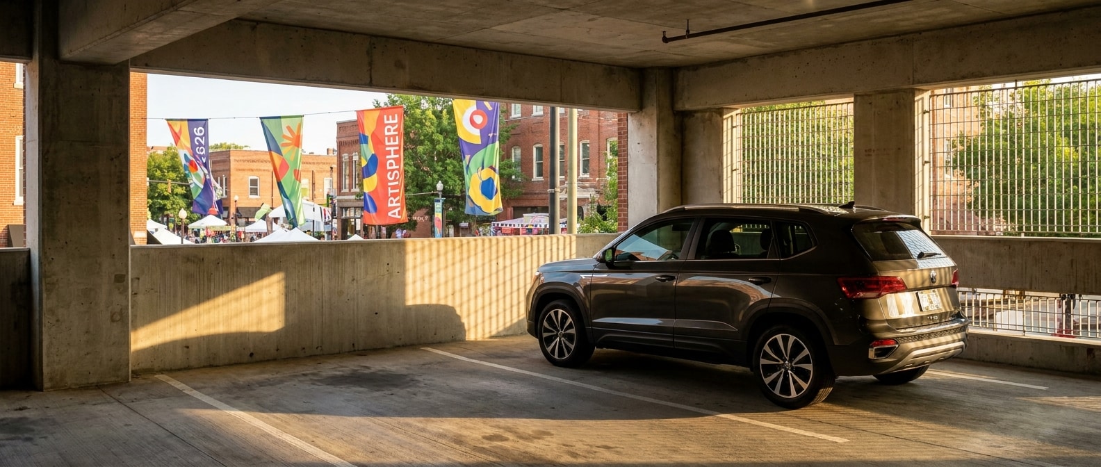 2026 Volkswagen Taos parked in a downtown Greenville parking garage during Fall for Greenville festival