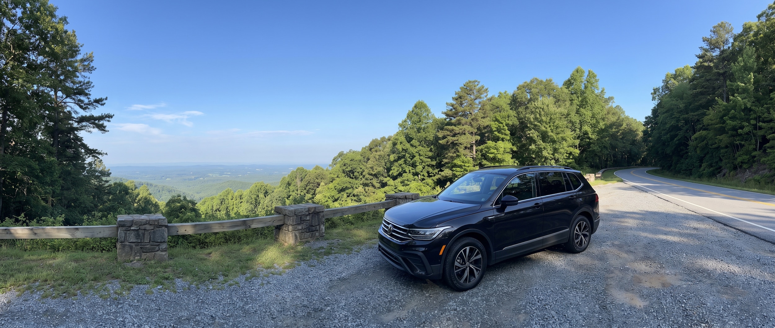 2026 Volvo XC90 with hatch open and camping gear at Paris Mountain State Park, Greenville SC, summer morning