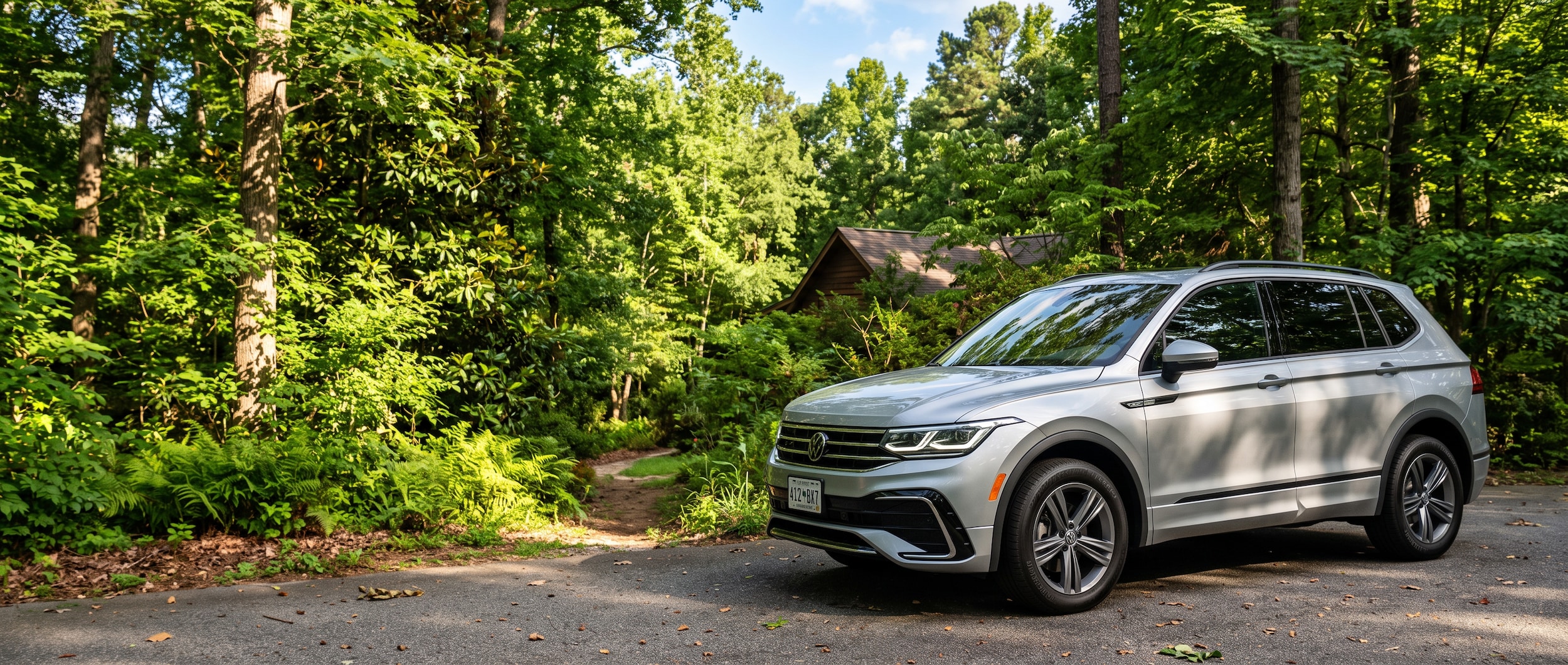 2026 Volkswagen Tiguan parked in Greenville SC summer heat during an end-of-July maintenance reset