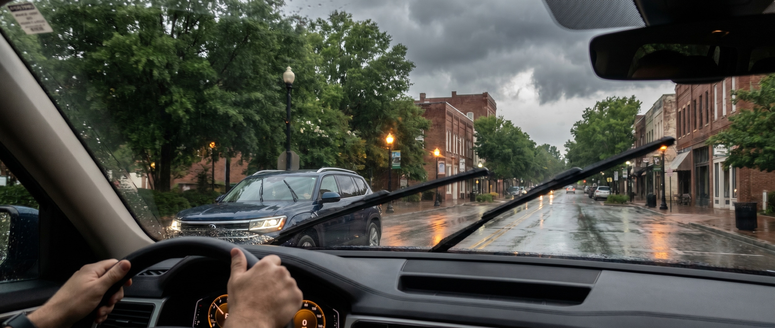 Volkswagen Atlas driving safely through thunderstorm conditions in Greenville, SC