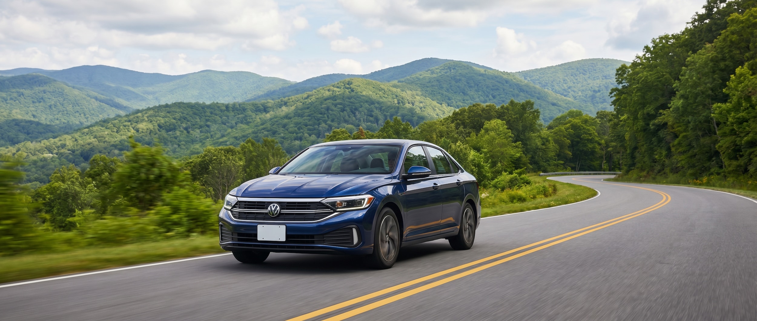 Volkswagen Jetta on scenic mountain highway between Greenville SC and Asheville
