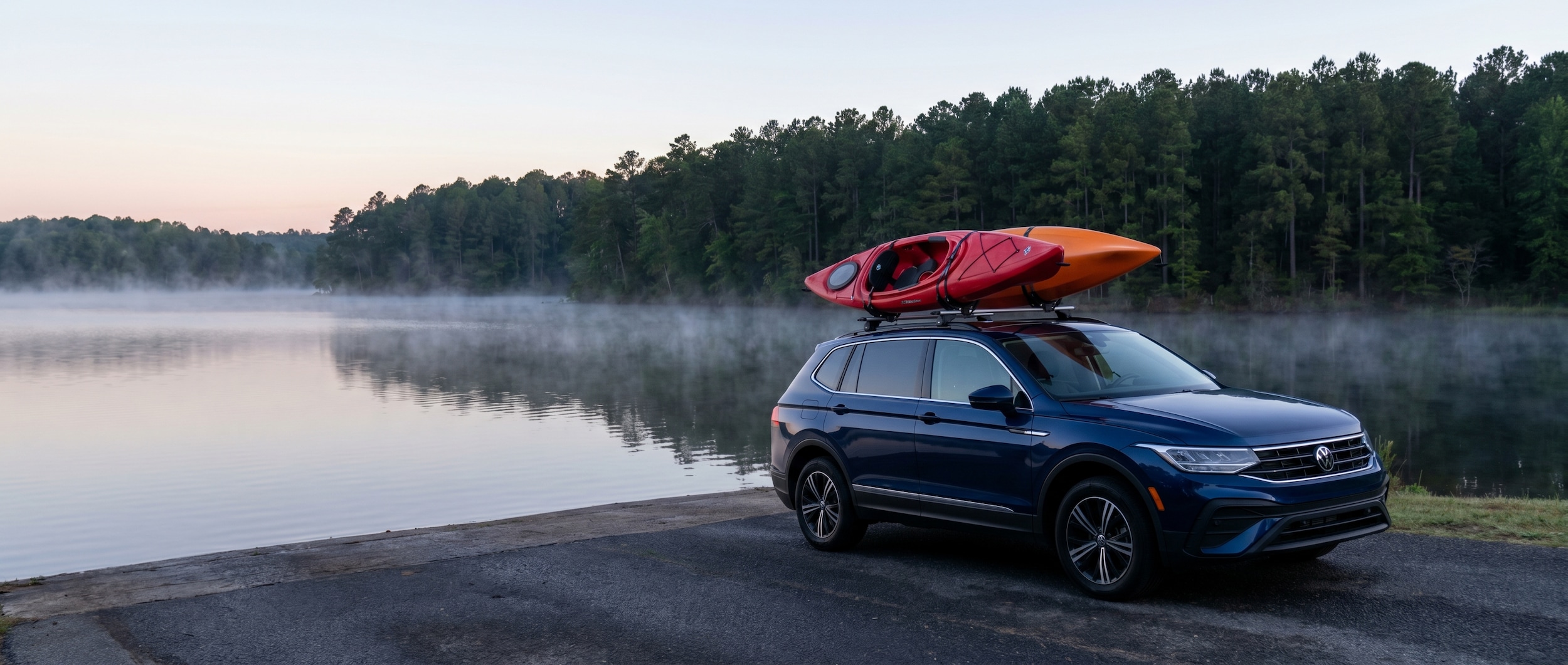Volkswagen Tiguan with kayaks at Lake Robinson near Greenville SC