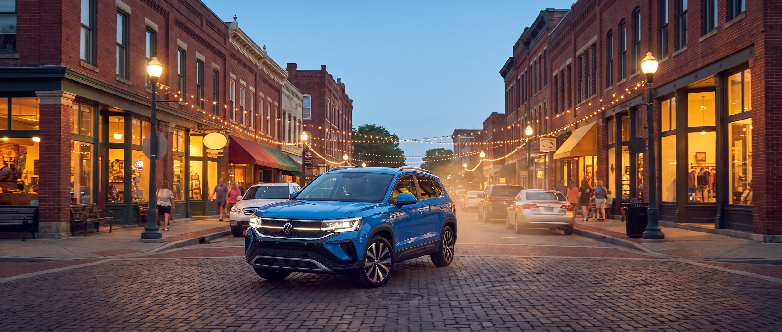 Volkswagen Taos compact SUV navigating downtown Greenville SC holiday traffic on the Fourth of July