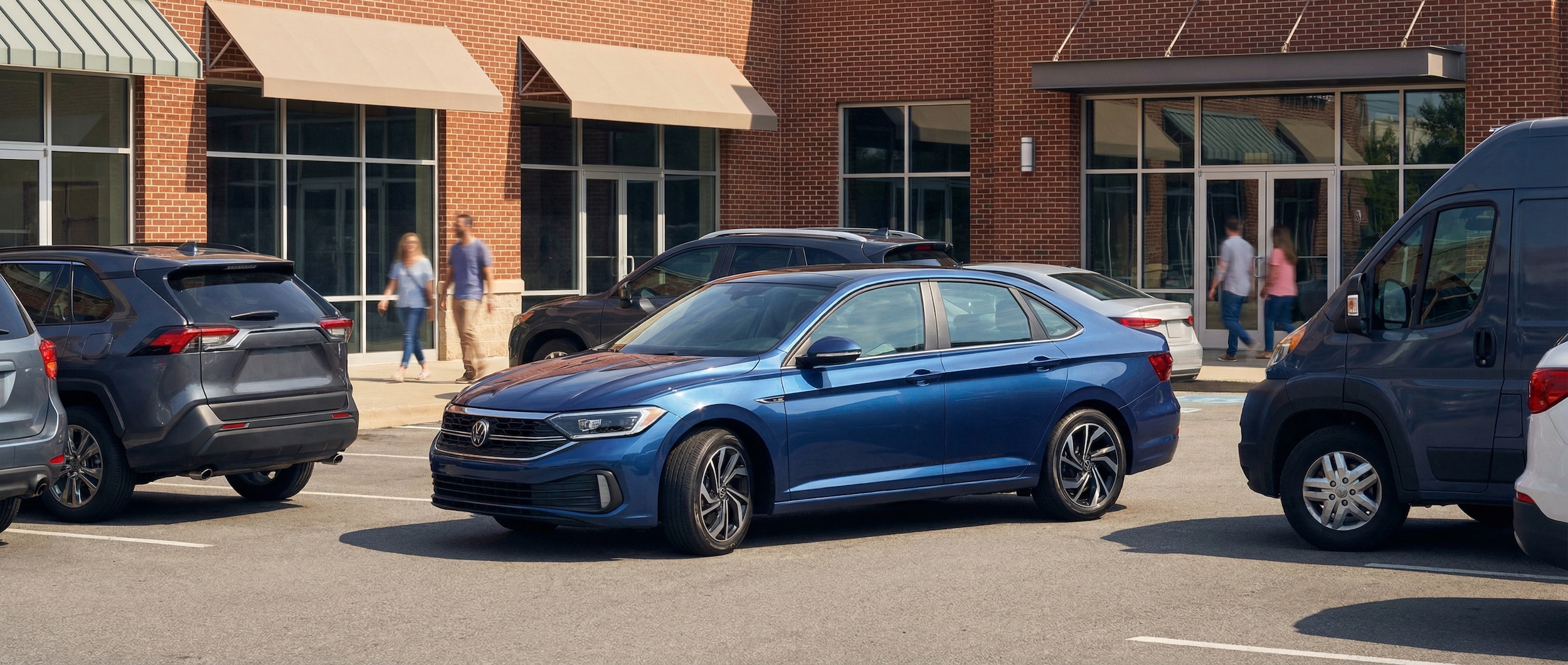 Volkswagen Jetta maneuvering through busy retail parking in Greenville, SC